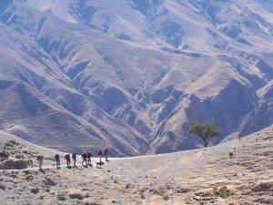 Hikers trekking Rio San Juan, Salta, Argentina