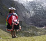 Ausangate lady in colourful native dress Ausangate Lodge Trek