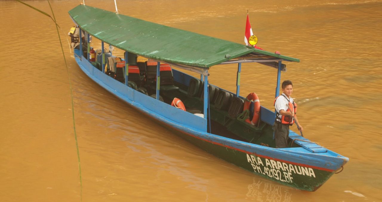 River canoe Tambopata Amazon Peru