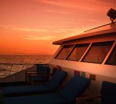 Eric sunset from deck Galapagos island cruise