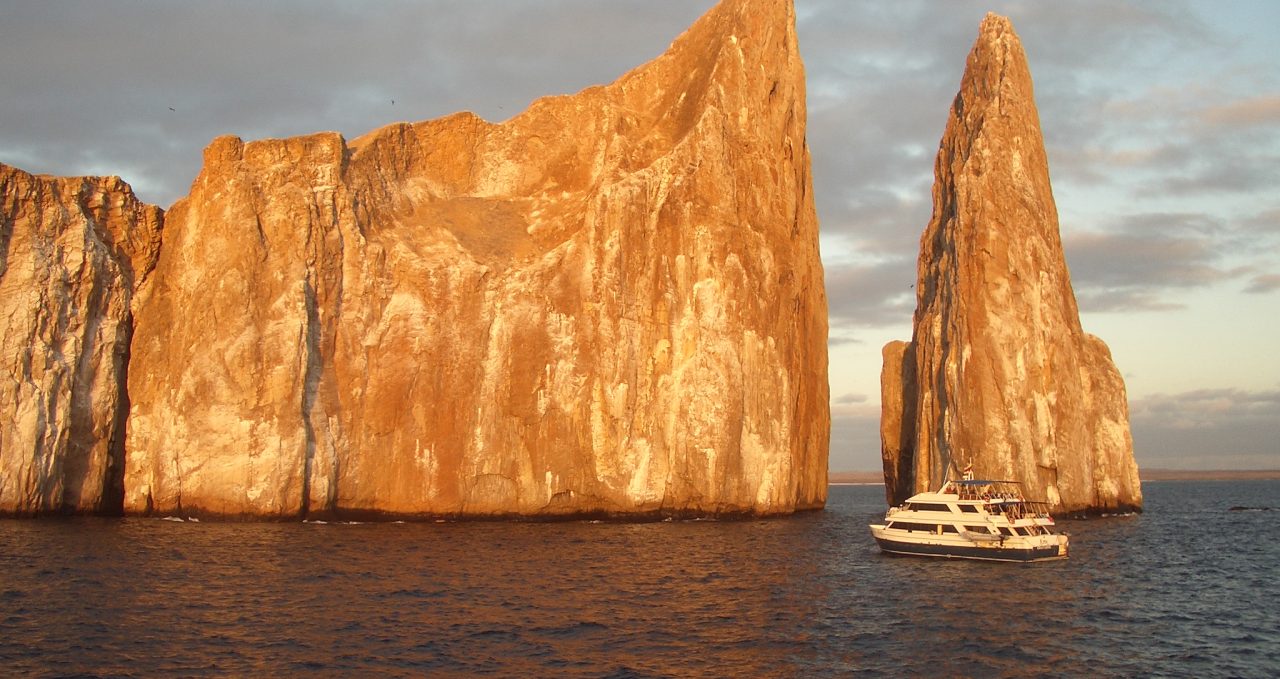 Sun lit Kicker Rock Galapagos