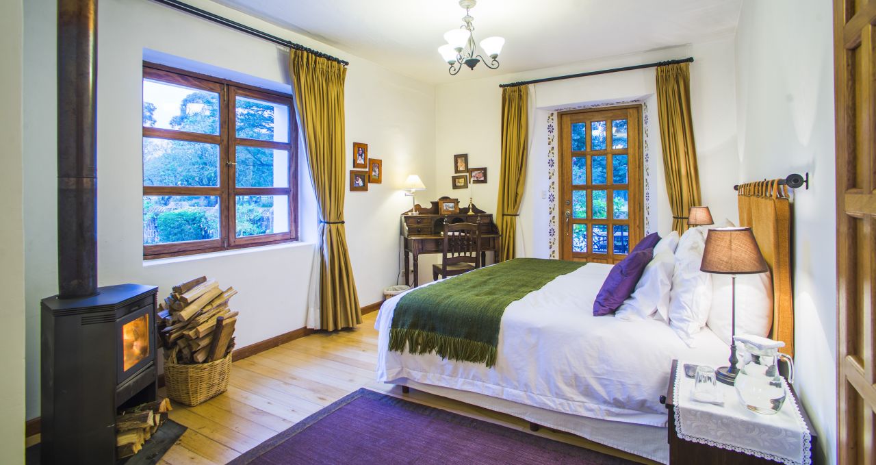 Hacienda Zuleta bedroom, luxury accommodation on a working farm, Imbabura, Ecuador