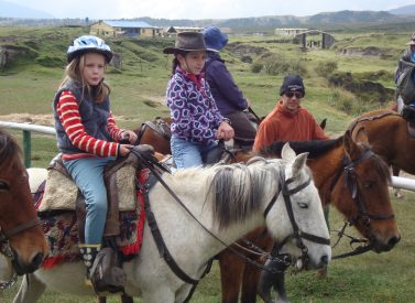 Kids horse riding Cotopaxi Ecuador