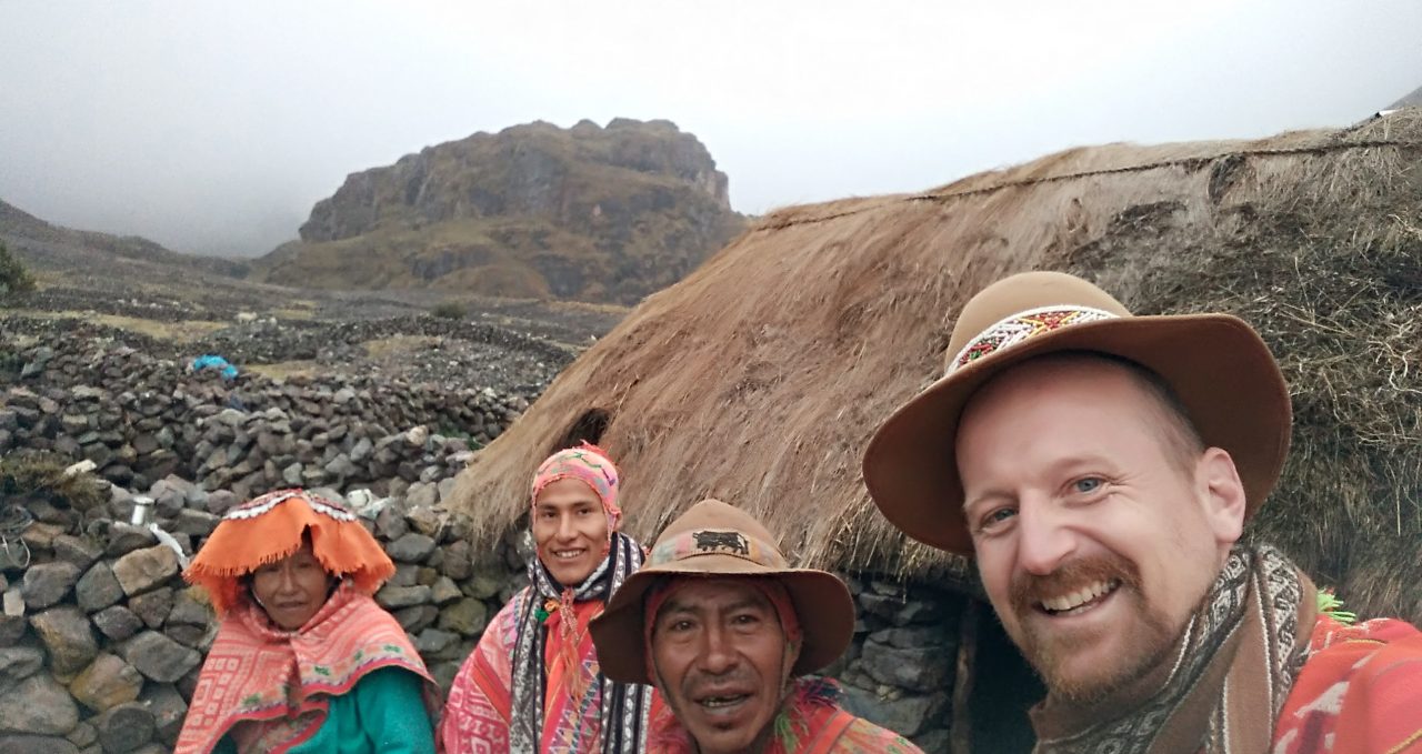 Trekker and andean family, Cancha Cancha, Lares, Peru
