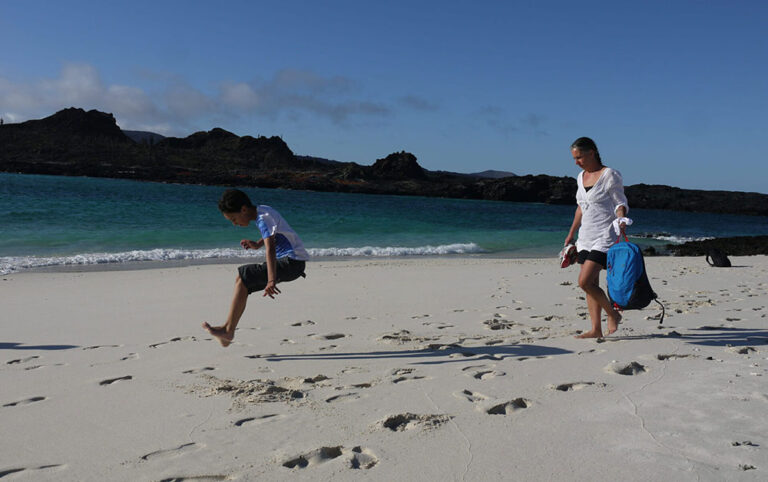 jumping child family holiday galapagos