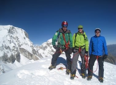 Climbers on Ishinca summit, Cordillera Blanca, Peru