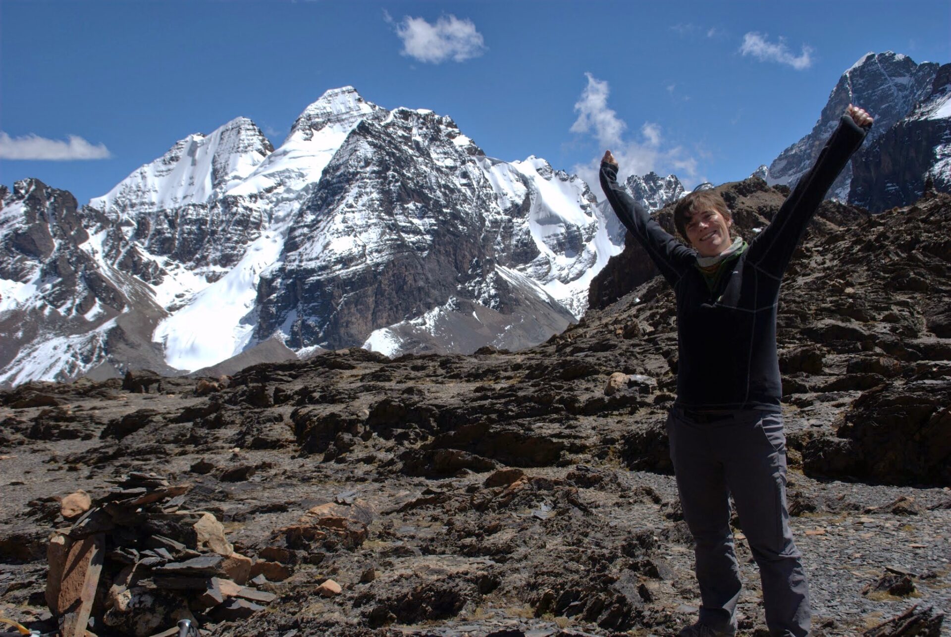 Trekker with views of Condoriri range Bolivia