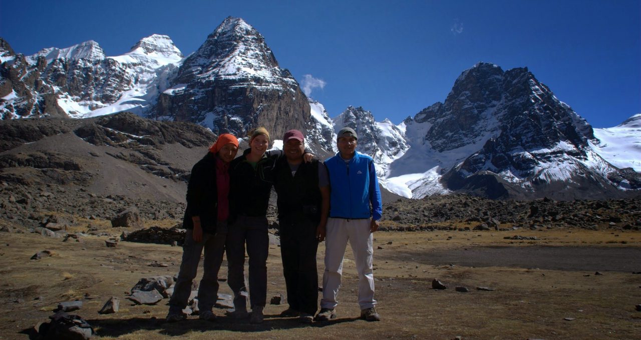 Trekking team in front of Condoriri range Bolivia