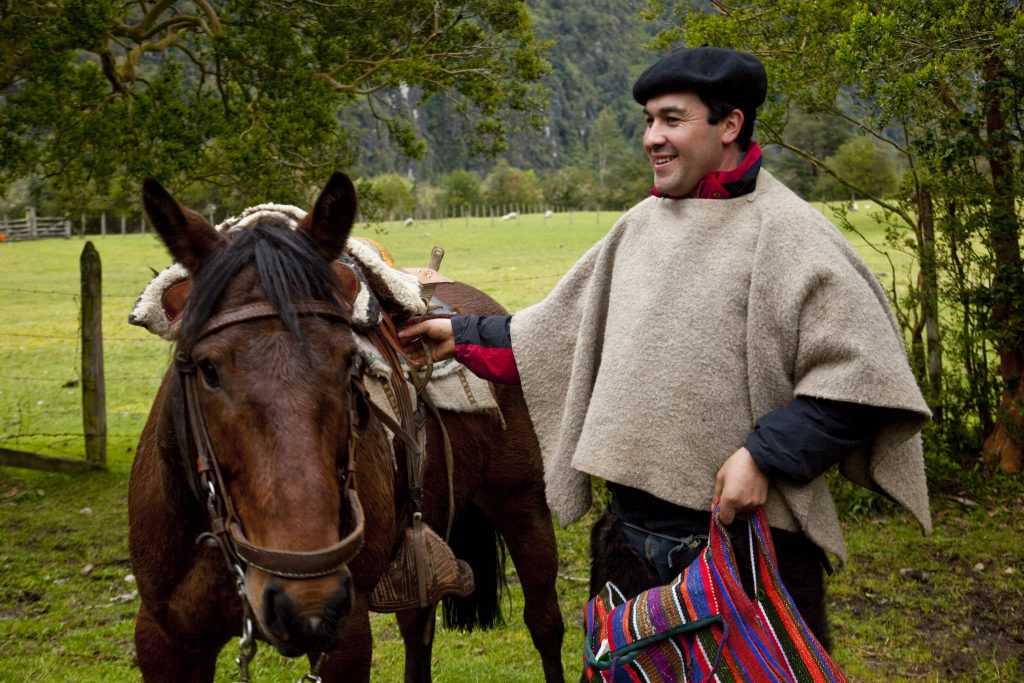 Huao and horse, Cochamo, Chile