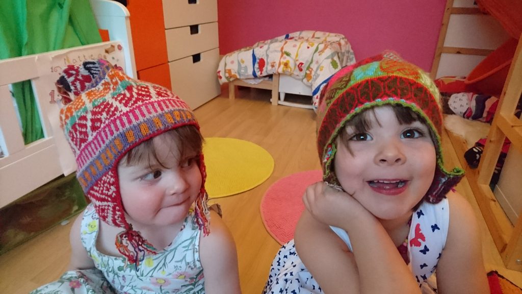 Kat's girls are excited wearing their hats for Ecuador