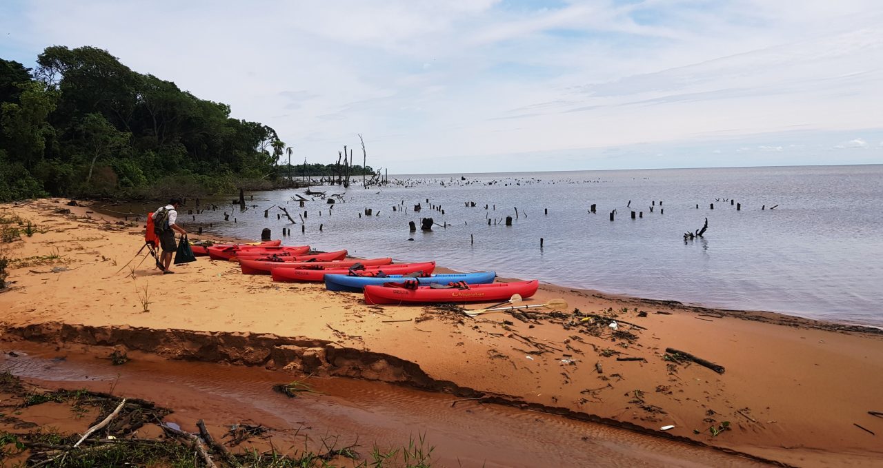 Kayaks on beach, Parana River, Puerto Valle, Argentina
