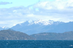 choppy lake and snowy peaks