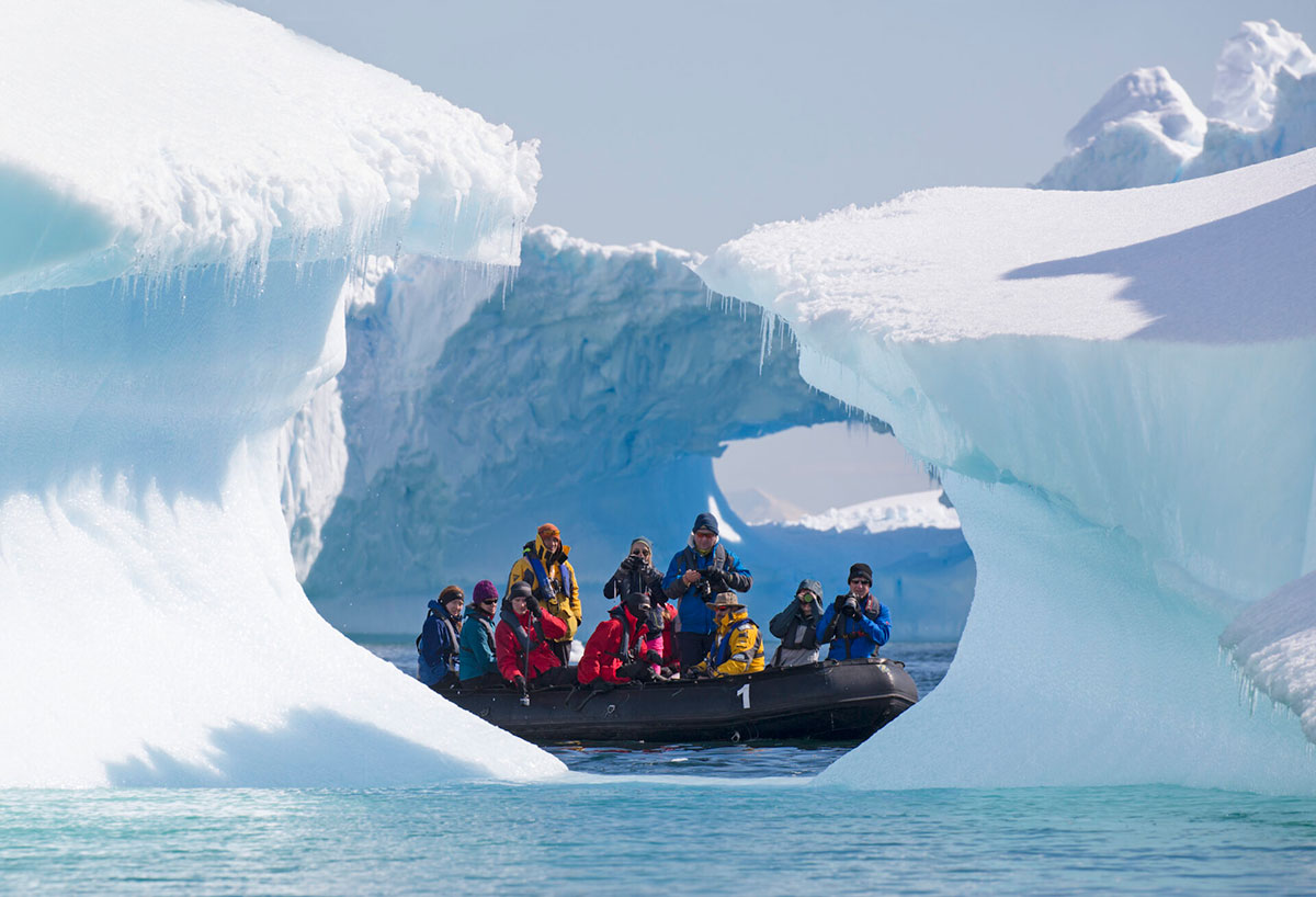 Zodiac and iceberg in Antarctica