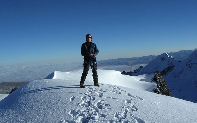 trekker on campa summit ausangate peru