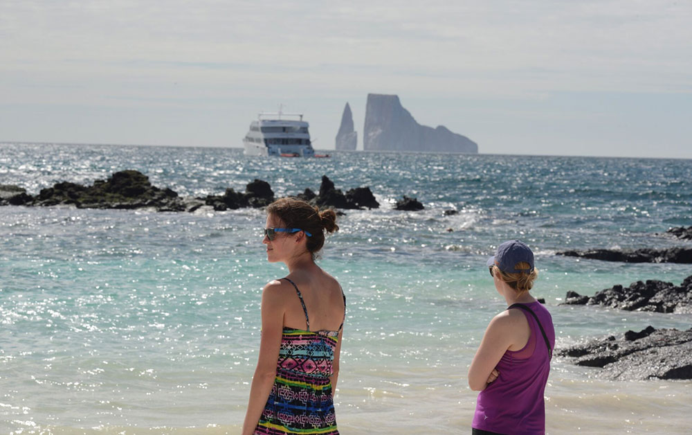 Beach and Kicker Rock EcoGalaxy First Class Galapagos Catamaran