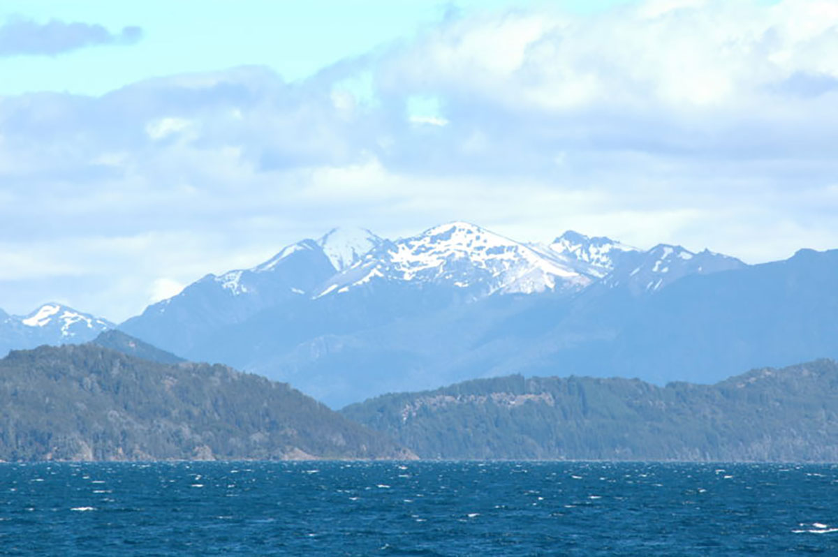 Choppy Lake And Snowy Peaks