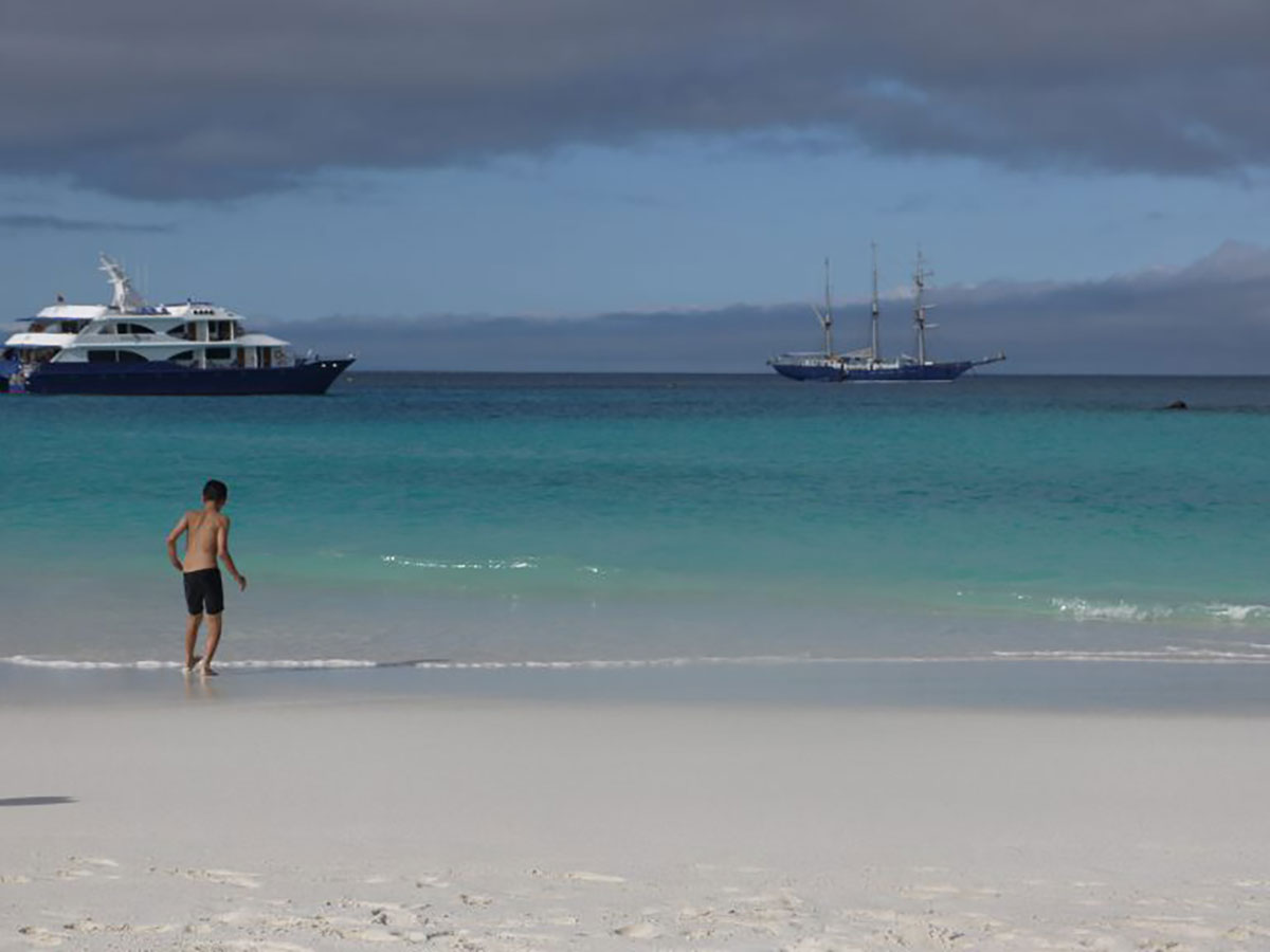 Enjoying the beach family holiday Galapagos