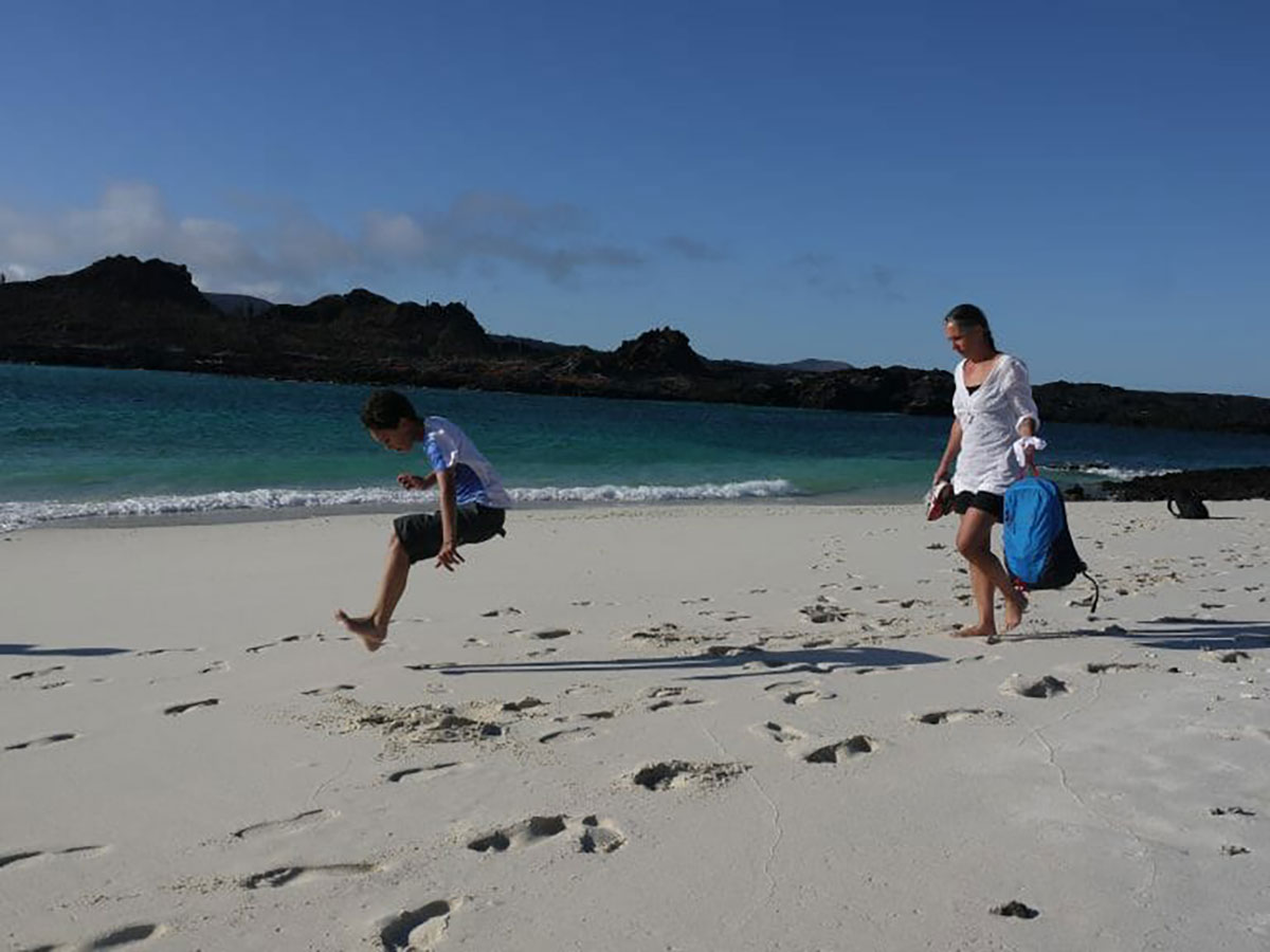 Jumping child family holiday Galapagos