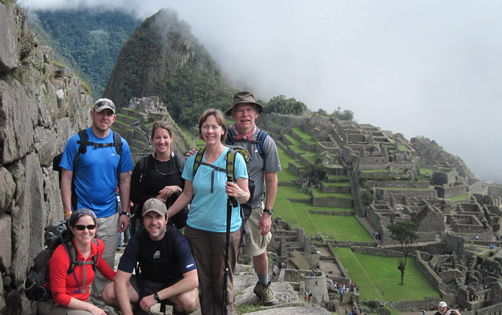 trekkers at machu picchu inca trail trek peru