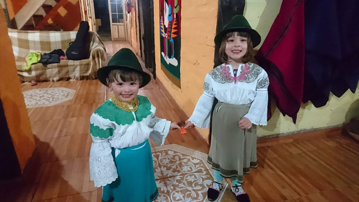 Ecuador San Clemente, girls in local dress