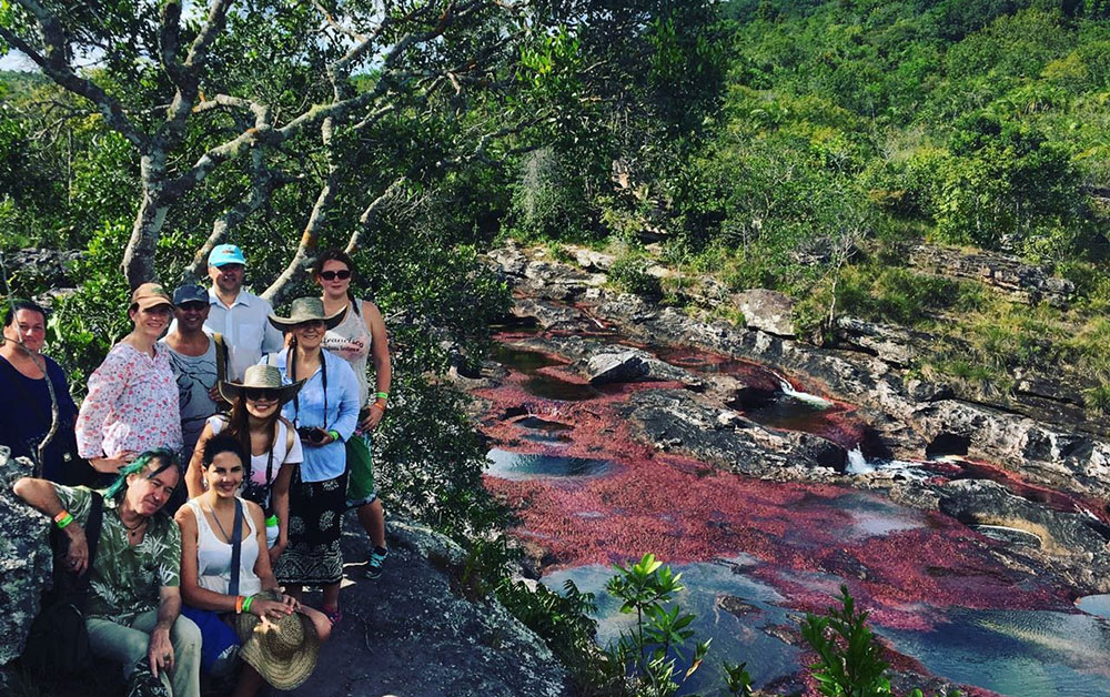 tourists at cano cristales colombia