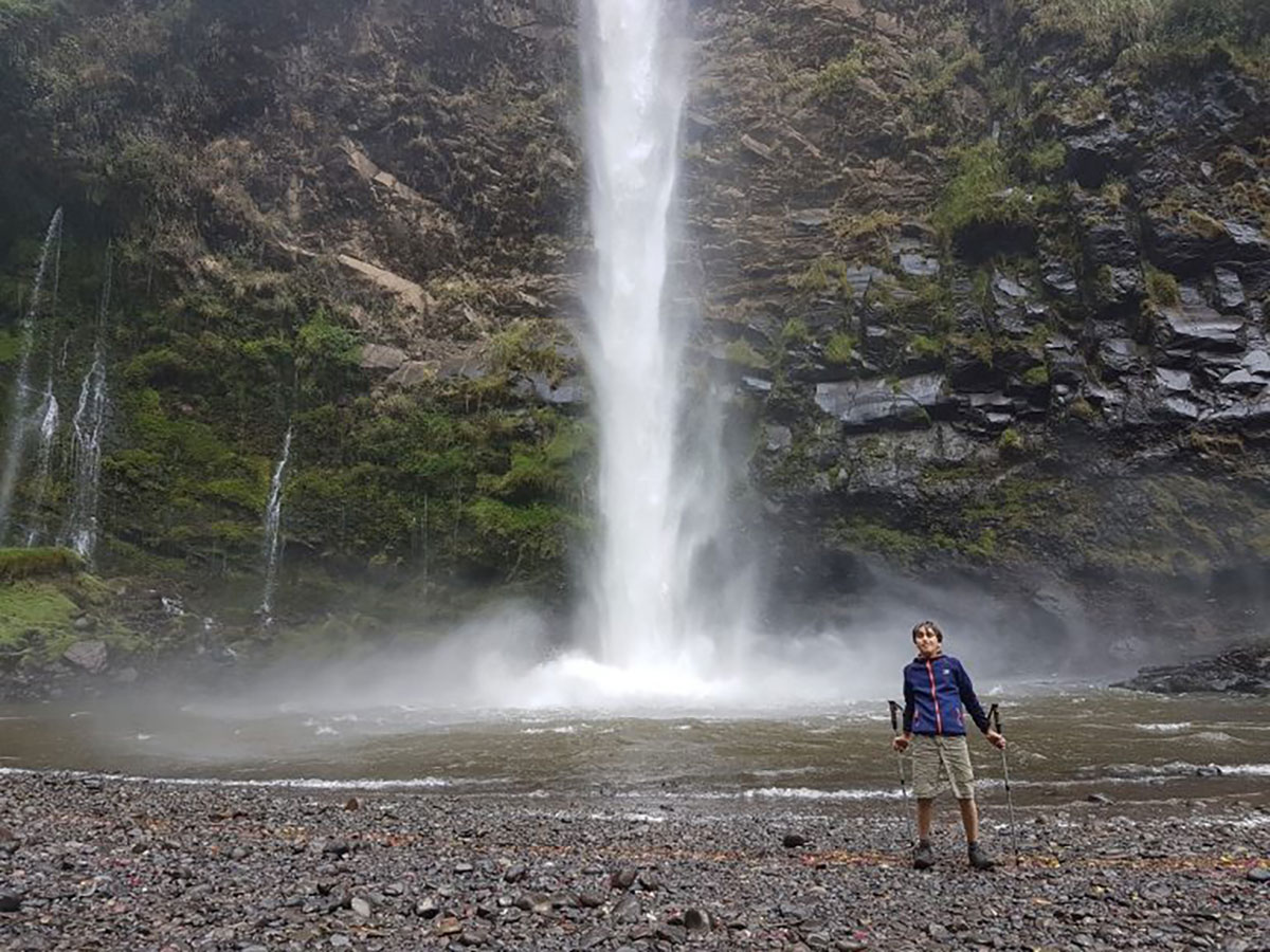 Kid And Waterfall On Ecuador Trekking Trip