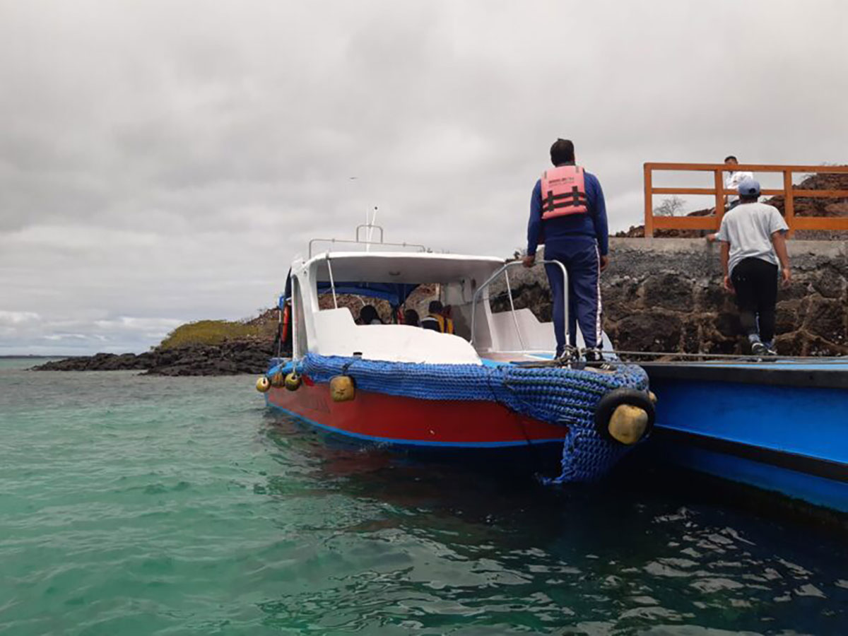 Water taxi to inter-island speedboat, Galapagos