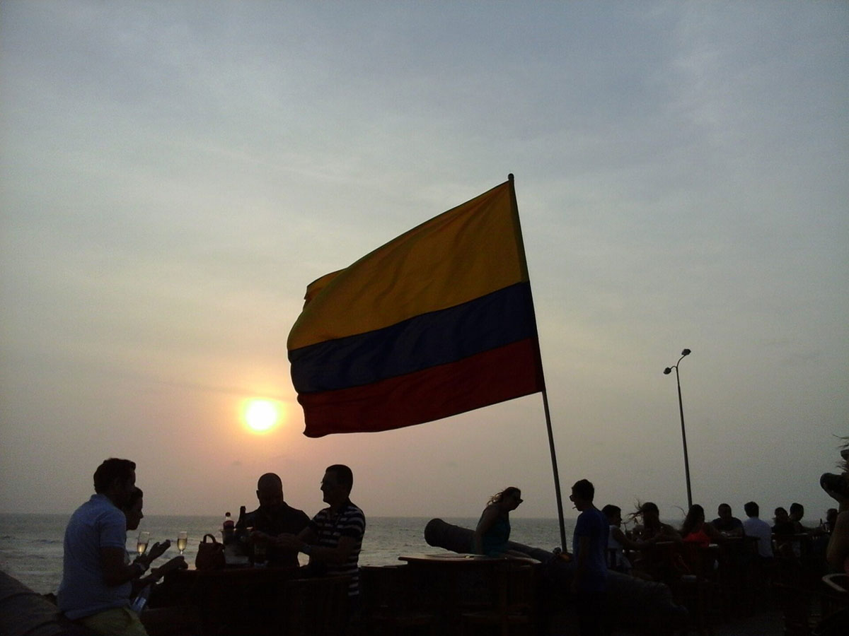 Cafe Del Mar Sunset And Flag Cartagena Colombia