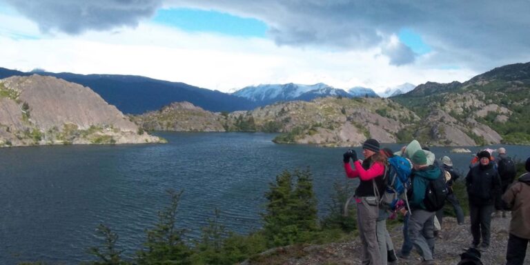 Trekkers At Laguna De Los Patos Fitzroy Patagonia Argentina