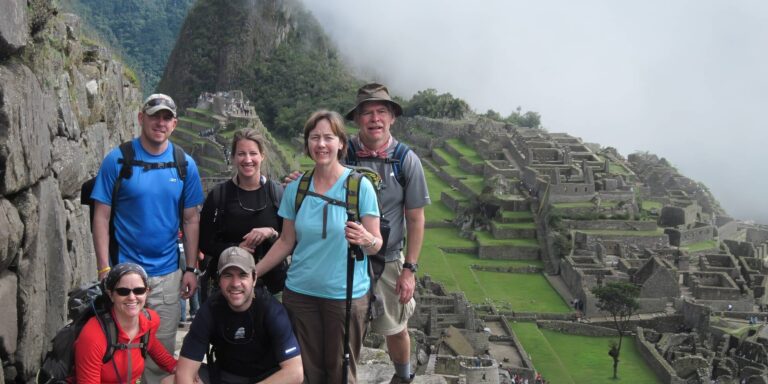 Trekkers At Machu Picchu Inca Trail Trek Peru