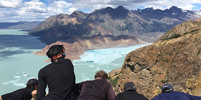 People looking at Videma Glacier view Huemul Trek Los Glaciares National Park Argentina