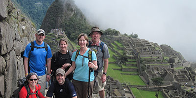 trekkers at machu picchu inca trail trek peru