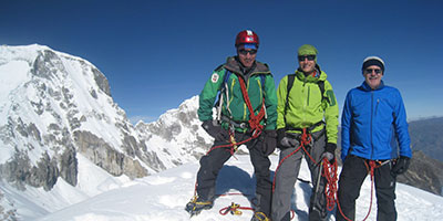 Climbers on Ishinca summit Cordillera Blanca Peru