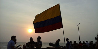 Cafe Del Mar Sunset And Flag Cartagena Colombia