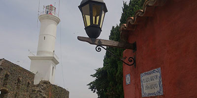 Lighthouse and street sign Colonia Uruguay