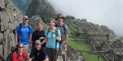 trekkers at machu picchu inca trail trek peru