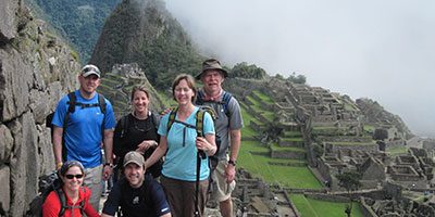 trekkers at machu picchu inca trail trek peru